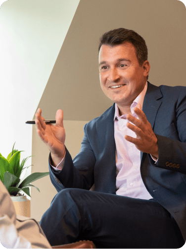 Matt Cross providing advie to a client on how to lead change with subtle shifts.